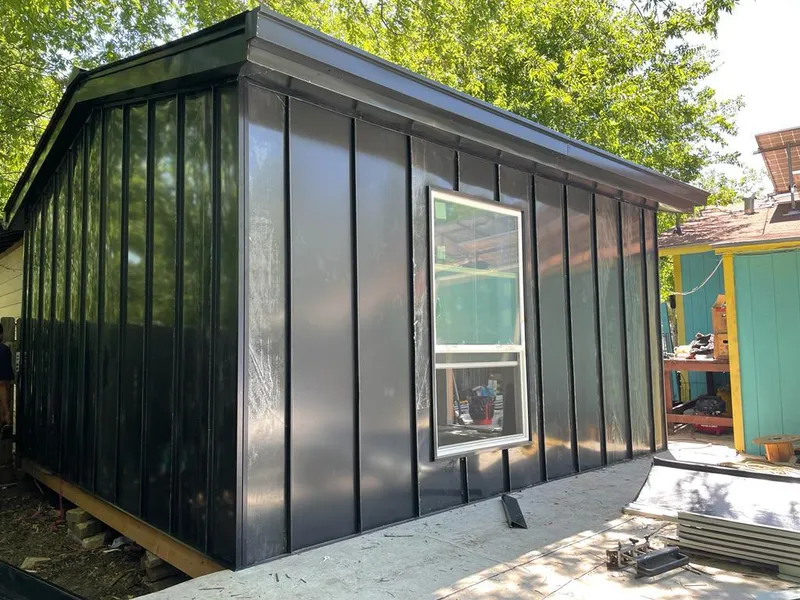 Black standing seam metal wall panels for Metal Roof Installation in Loudon