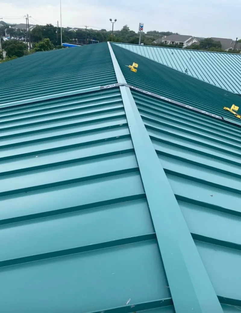 Green commercial metal roof ridge and valley for Metal Roof Repair in Loudon